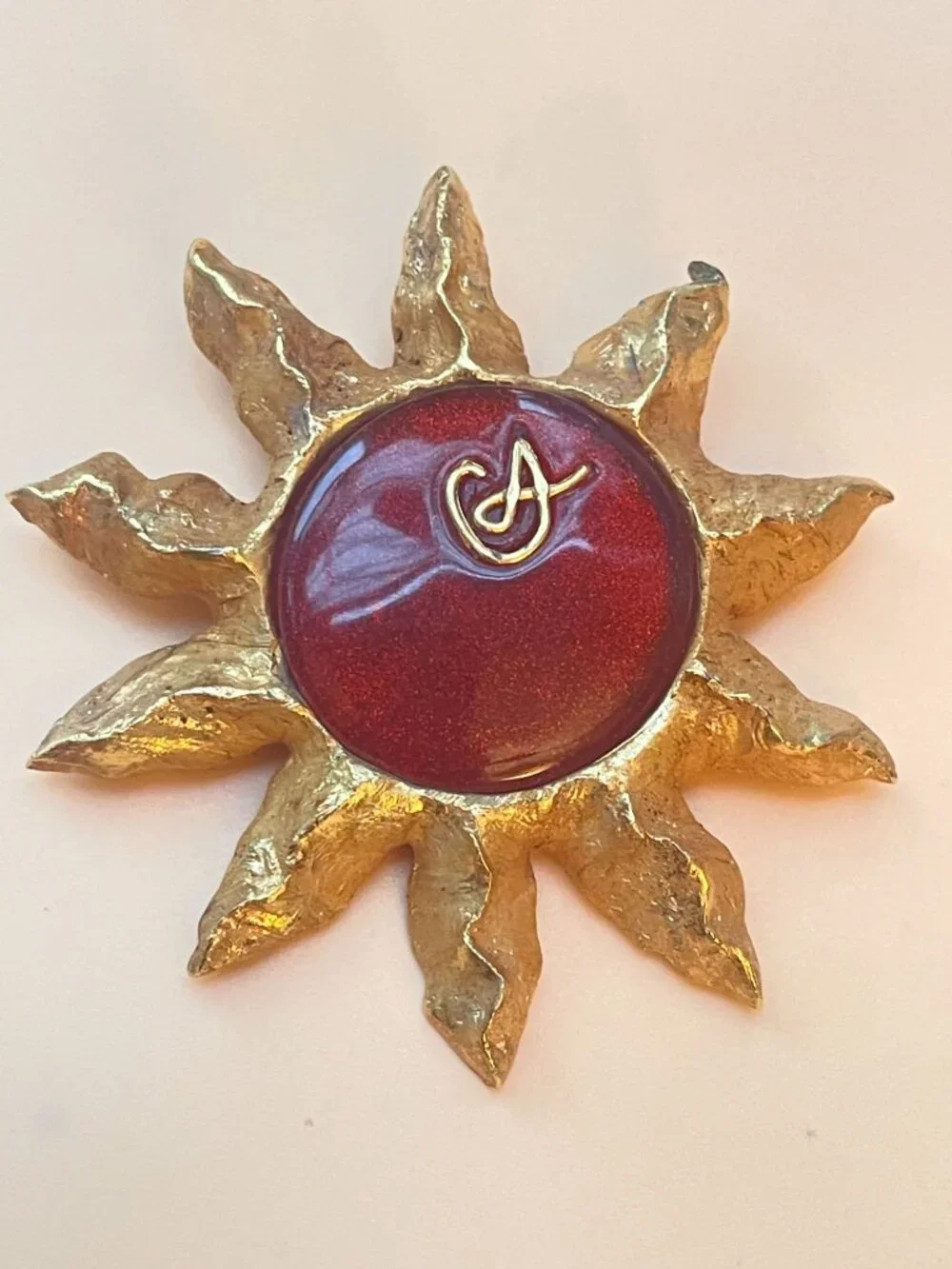 Christian Lacroix Gold-Tone Sun Brooch W/ Red Resin Center & Golden Logo